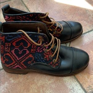 Egyptian handmade lace up boots.